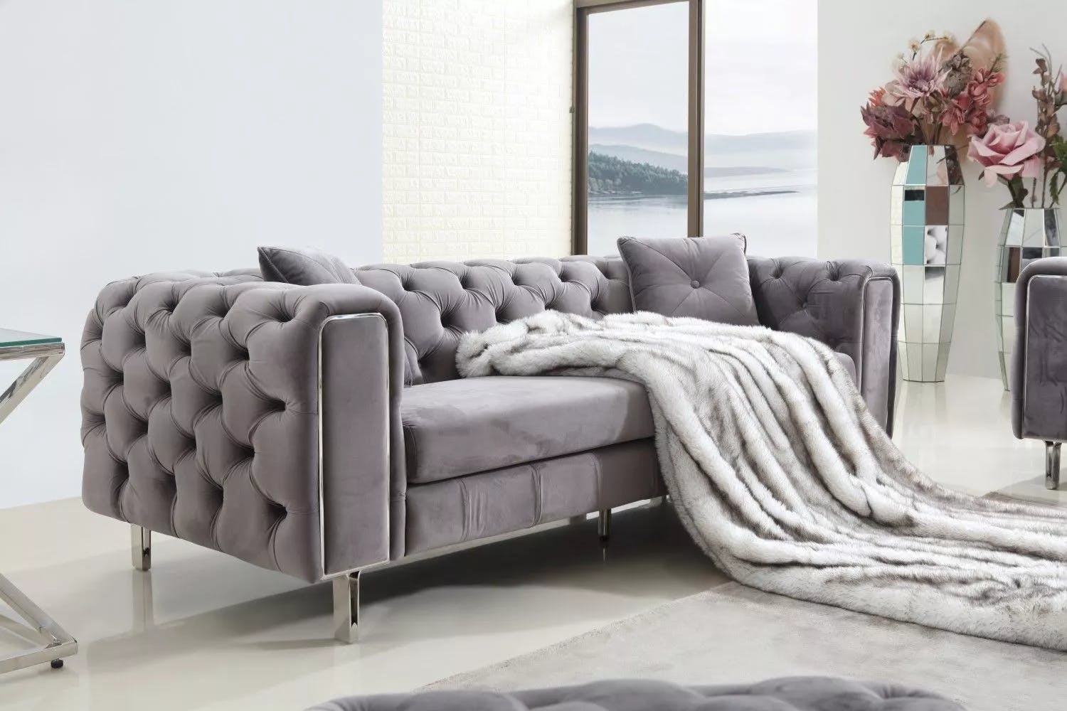 Silver tufted deals sofa